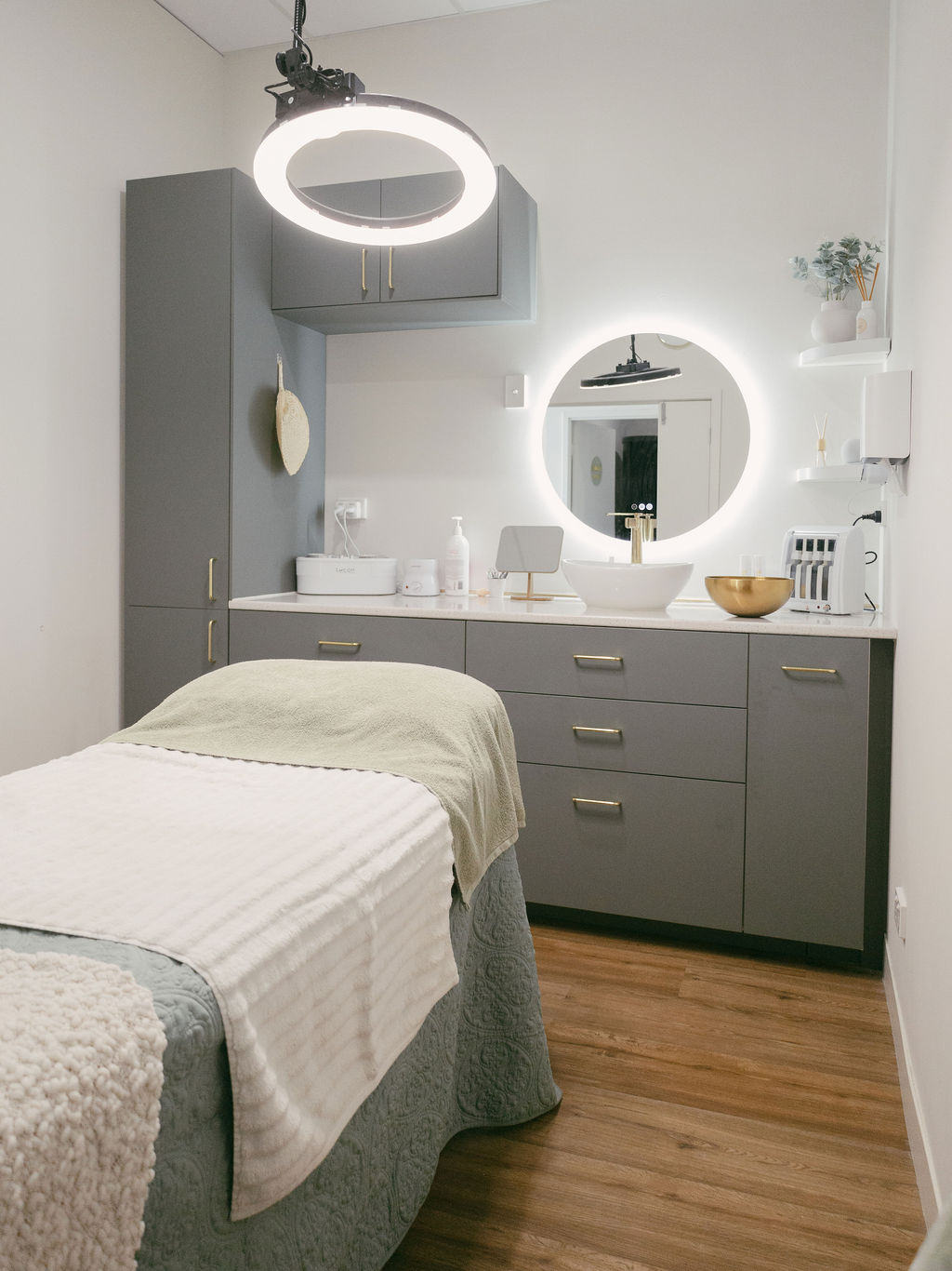 Inside the All Things Beauty clinic — warm, calm treatment space